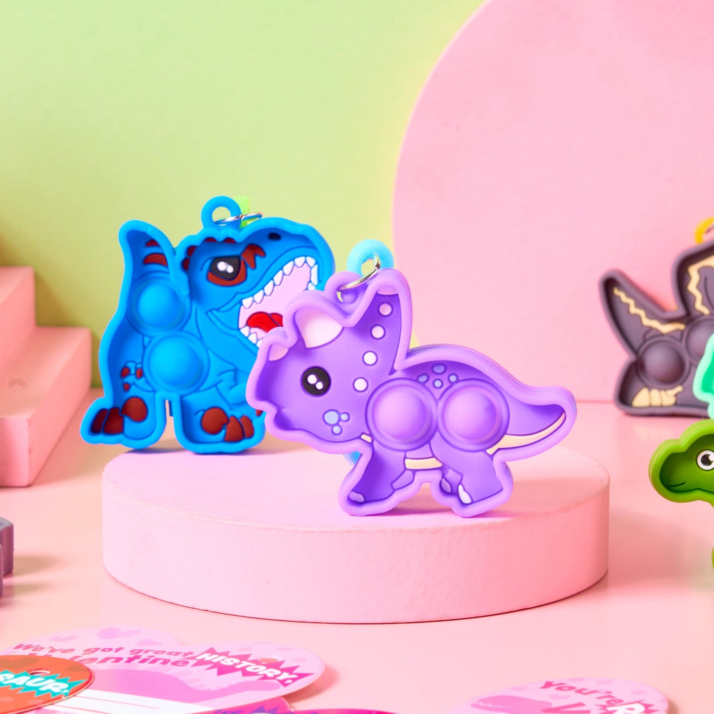 JOYIN 28 Packs Valentine's Day Gift Cards with Pop Keychain Toys, Dinosaur Stress Anxiety Relief Toys with Cards for Kids Valentine's Classroom Exchange Prizes Party Favors
