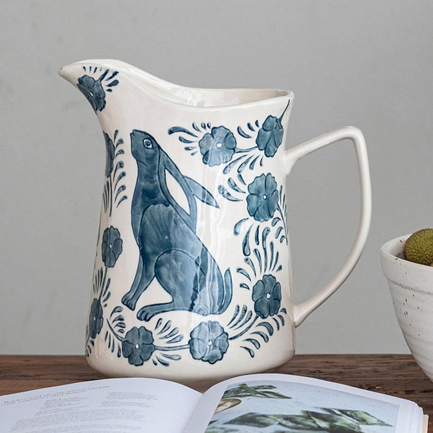 Creative Co-Op Stoneware Pitcher with Painted Rabbit and Florals, Blue and Cream