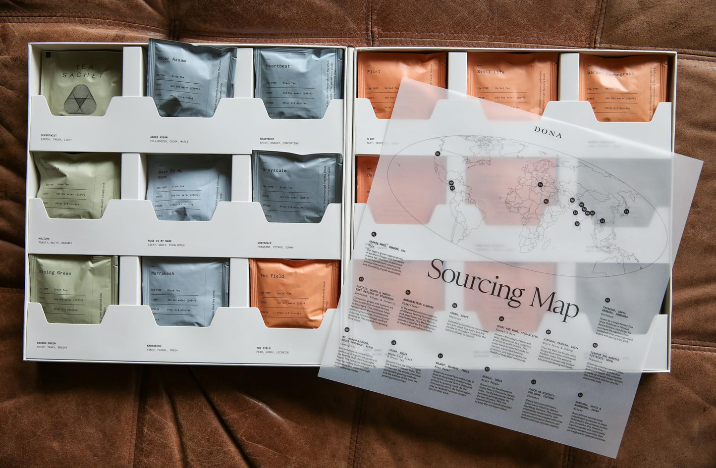 Dona Tea Library - 18 premium blended teas conveniently packaged in 36 plant-based sachets and stored in an elegant case