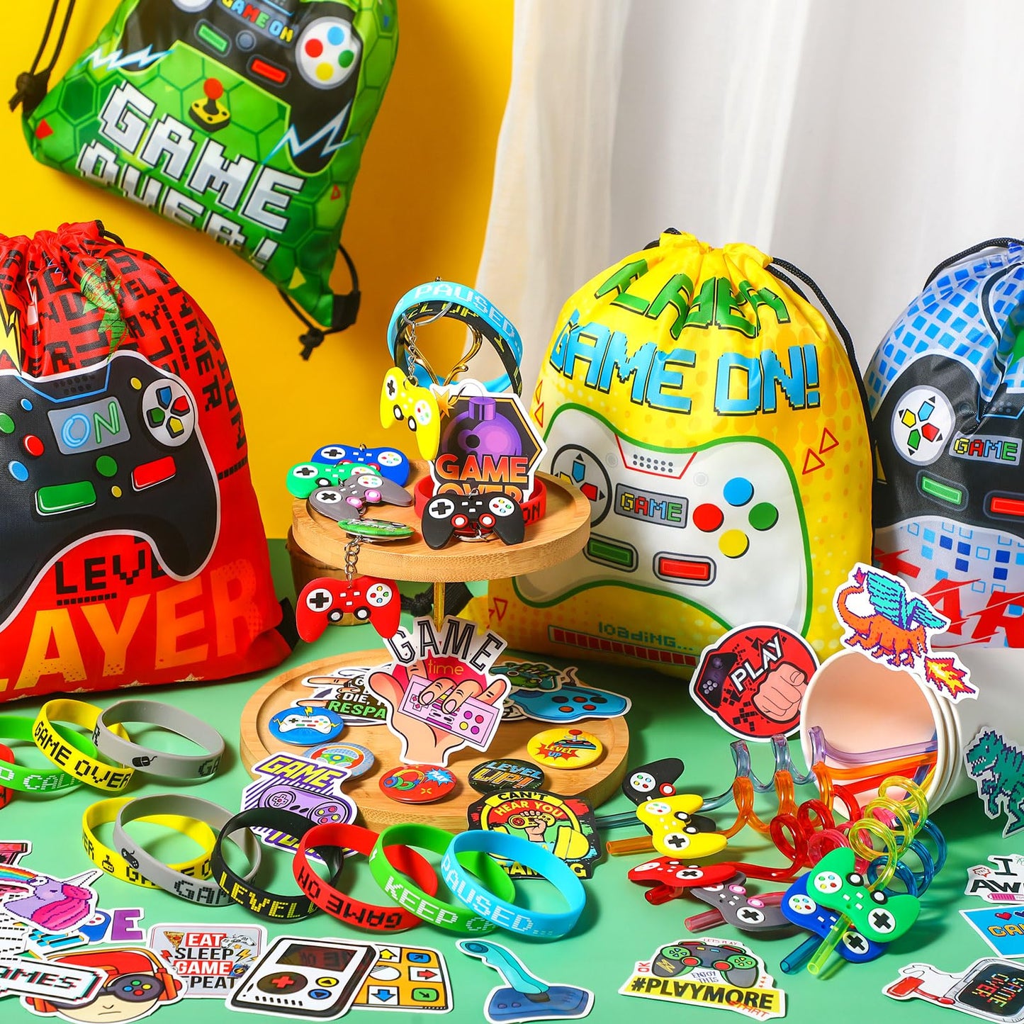 Sadnyy 140 Pcs Video Game Party Favors Birthday Party Decorations Supplies Drawstring Bags with Silicone Bracelets Keychains Straws Button Pins Stickers for Classroom Rewards Goodie Bags Stuffers