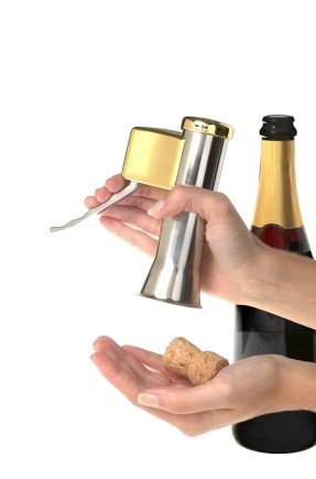 Descorjet Champagne Bottle Opener. Open your bottles with this One-hand corkscrew. Elegant, original and easy to use. Stainless steel with golden details. (Model Gold)