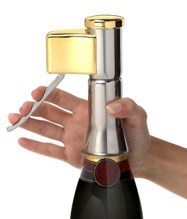 Descorjet Champagne Bottle Opener. Open your bottles with this One-hand corkscrew. Elegant, original and easy to use. Stainless steel with golden details. (Model Gold)