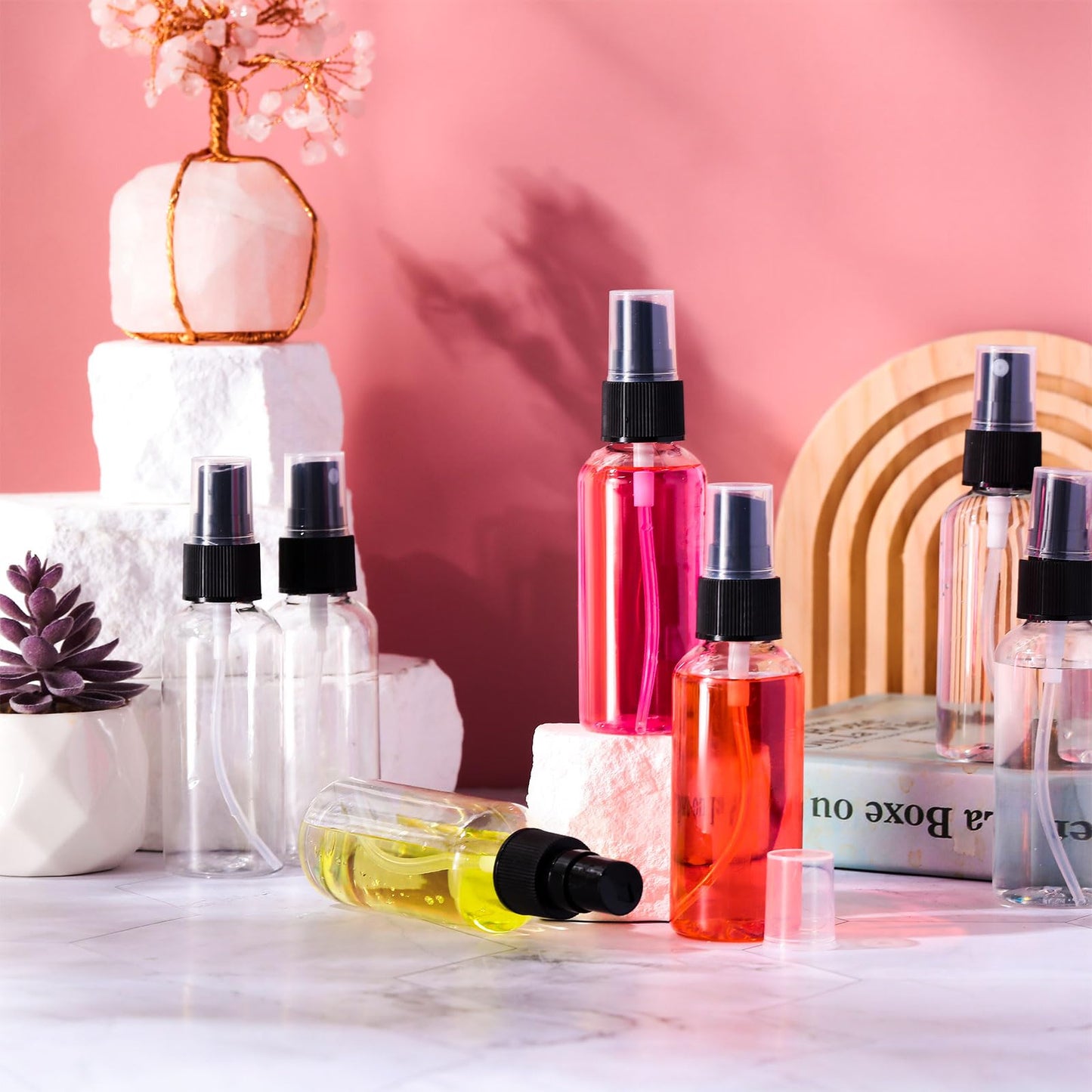Roshtia 200 Pcs 2 oz Plastic Mini Spray Bottles with Black Cap Clear Empty Fine Mist Spray Bottles Refillable Liquid Container for Essential Oils Perfumes Travel Makeup