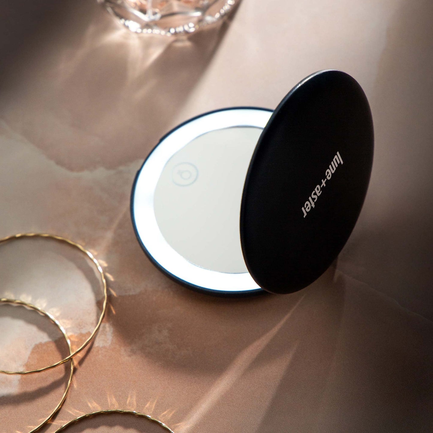 Lune+Aster Rechargeable LED Compact Mirror - Perfect for The Jetsetter or gal on The go, This Compact LED Mirror is Easy to stash in a Small Handbag or Travel Bag.