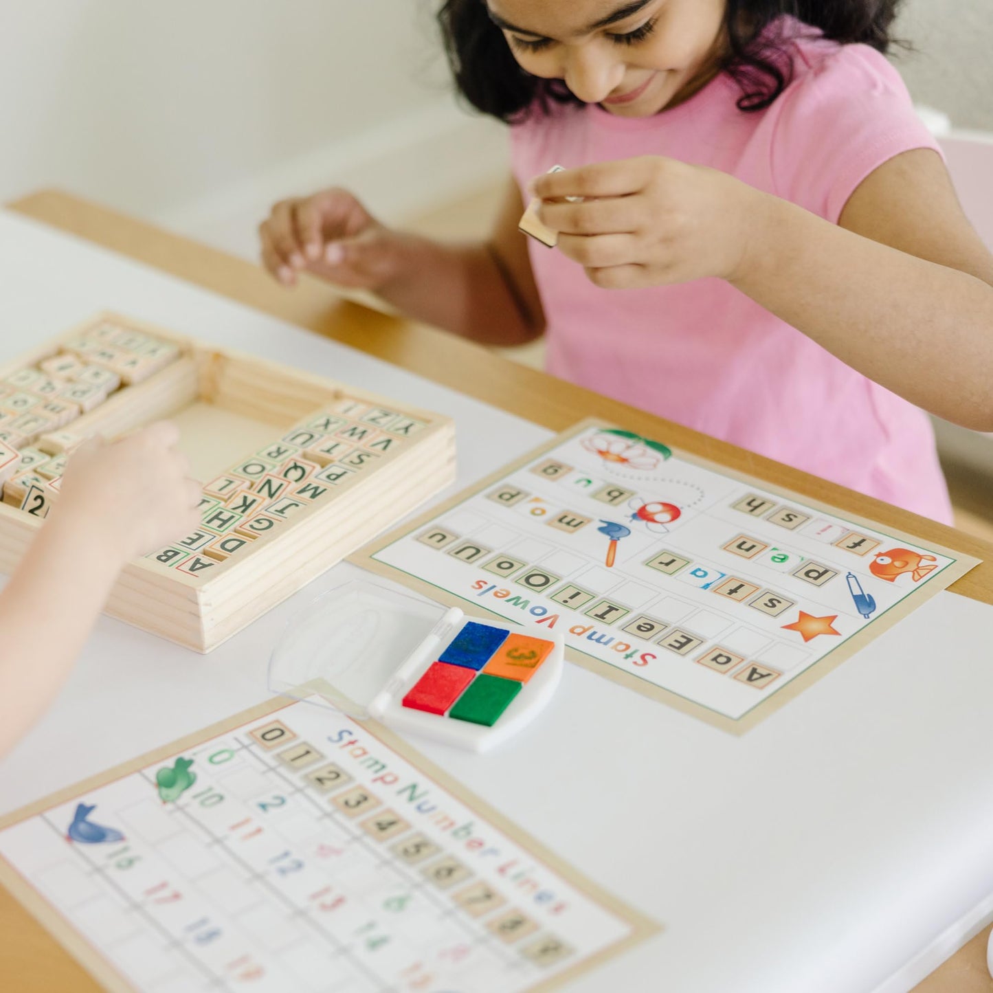 Melissa & Doug Deluxe Letters and Numbers Wooden Stamp Set ABCs 123s With Activity Book, 4-Color Stamp Pad