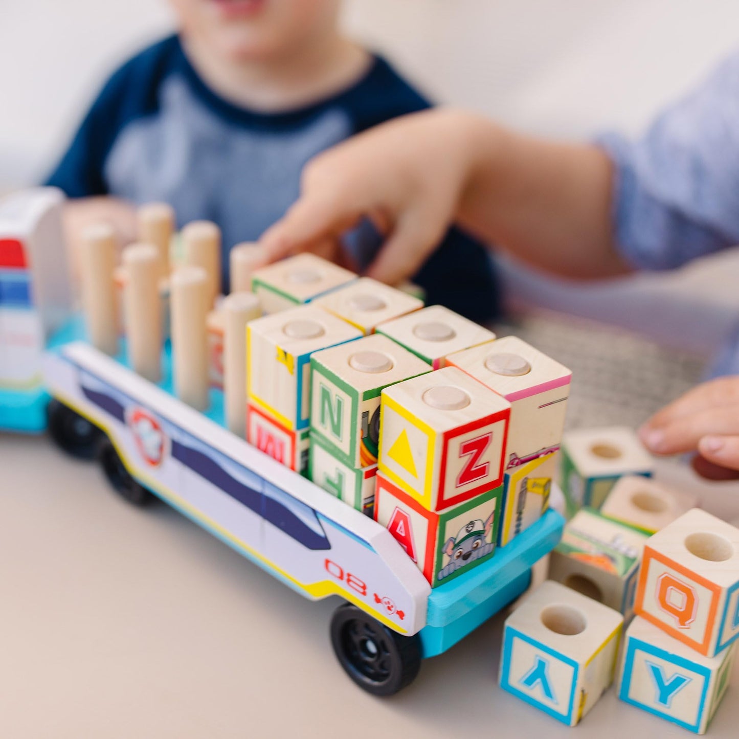 Melissa & Doug PAW Patrol Wooden ABC Block Truck (33 Pieces) PAW Patrol Sort and Stack Toys, Alphabet Blocks for Toddlers, Wooden Vehicle Toys for Kids Ages 3+