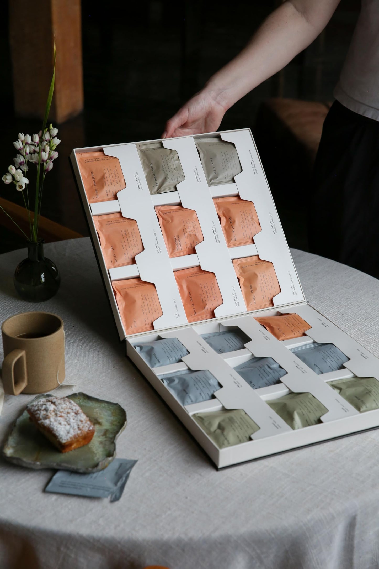 Dona Tea Library - 18 premium blended teas conveniently packaged in 36 plant-based sachets and stored in an elegant case