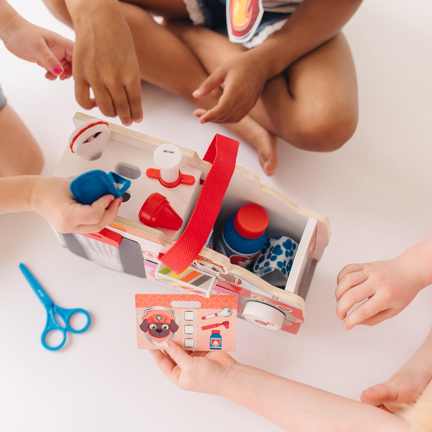 Melissa & Doug PAW Patrol Marshall's Wooden Rescue EMT Caddy (14 Pieces) PAW Patrol Take-Along Pretend Play First Responder Rescue Kit, Toddler Toy for Girls and Boys Ages 3+