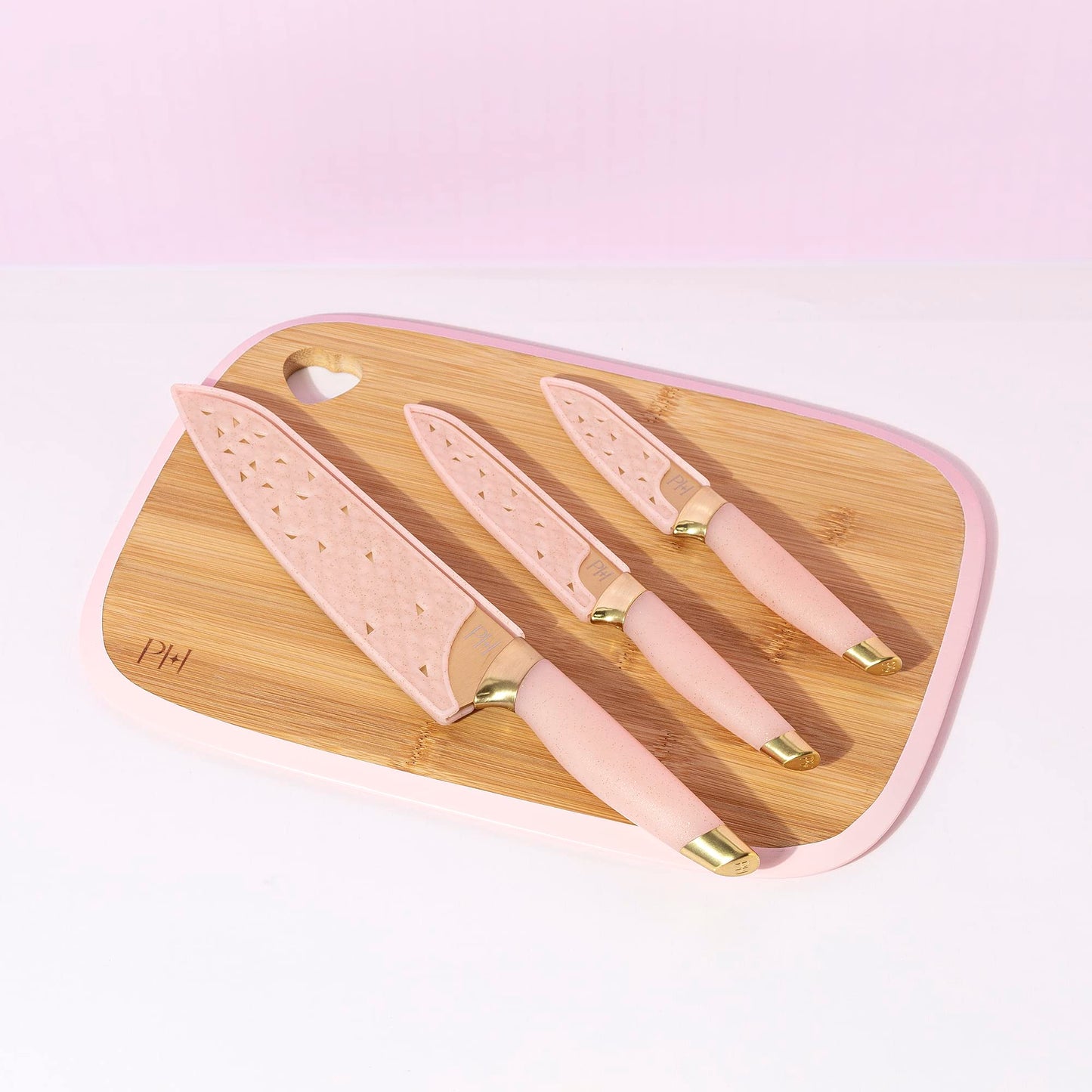 Paris Hilton Bamboo Cutting Board for Kitchen, Reversible Cutting Board and Cutlery Set with High Carbon Stainless Steel Knives and Blade Guards, Comfortable Handle Grips, 7-Piece Set, Gold and Pink