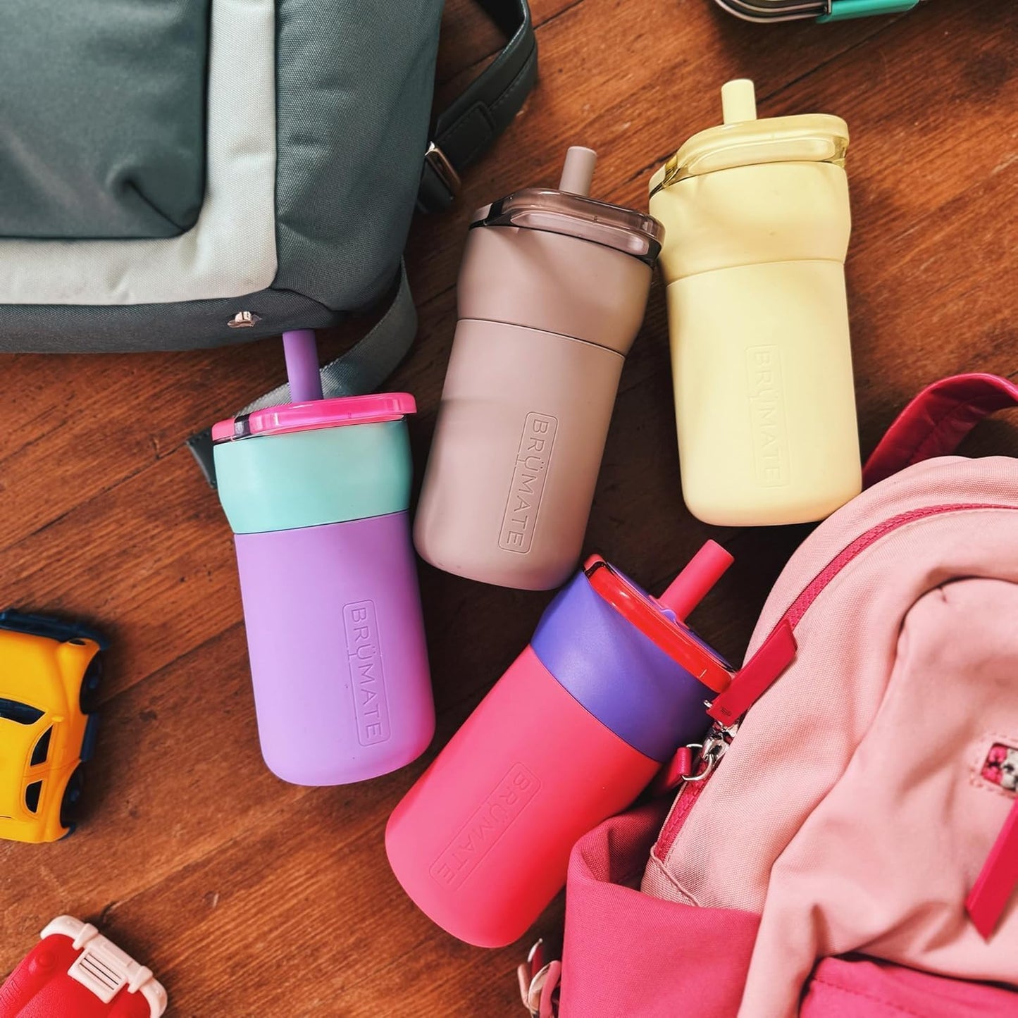 BrüMate Leap 12oz 100% Leakproof Kids Tumbler with Handle and Silicone Soft Straw | Drop Resistant Silicone Sleeve | For Kids 4+ | Insulated Stainless Steel | Cup Holder Friendly | 12oz (Dinos)