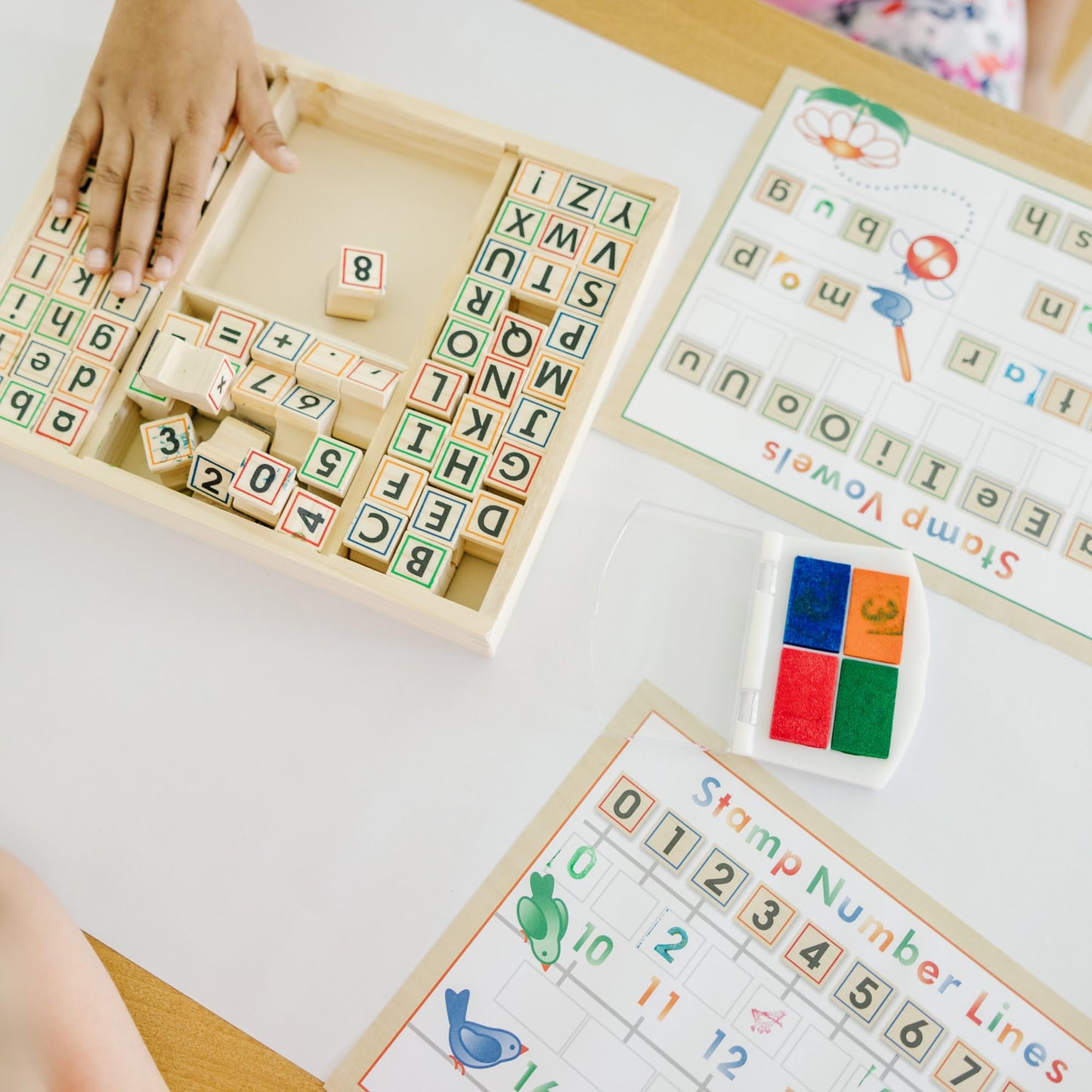 Melissa & Doug Deluxe Letters and Numbers Wooden Stamp Set ABCs 123s With Activity Book, 4-Color Stamp Pad