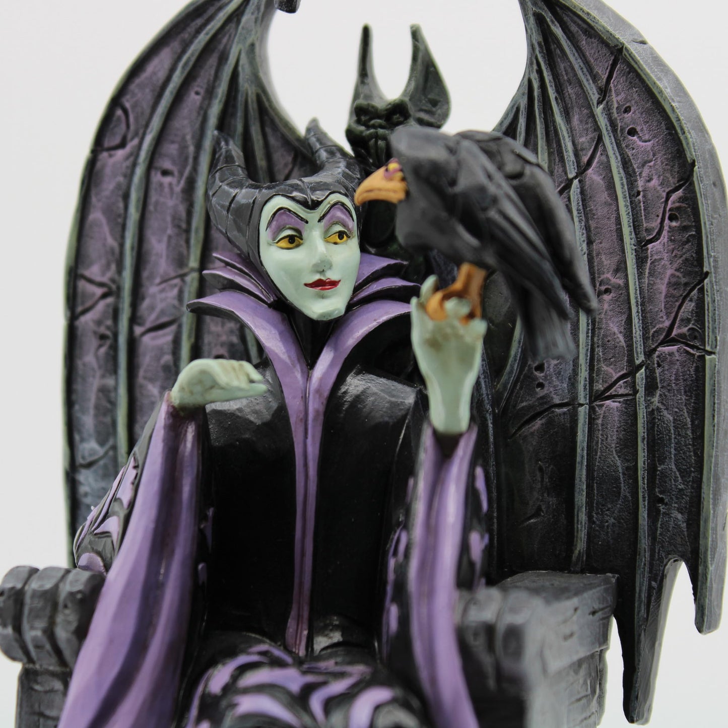 Enesco Disney Traditions Collection by Jim Shore Sleeping Beauty Maleficent Sitting on Throne Figurine- Resin Hand Painted Crafted Disney Halloween Collectible Figurines Home Decor Statue, 4 Inch