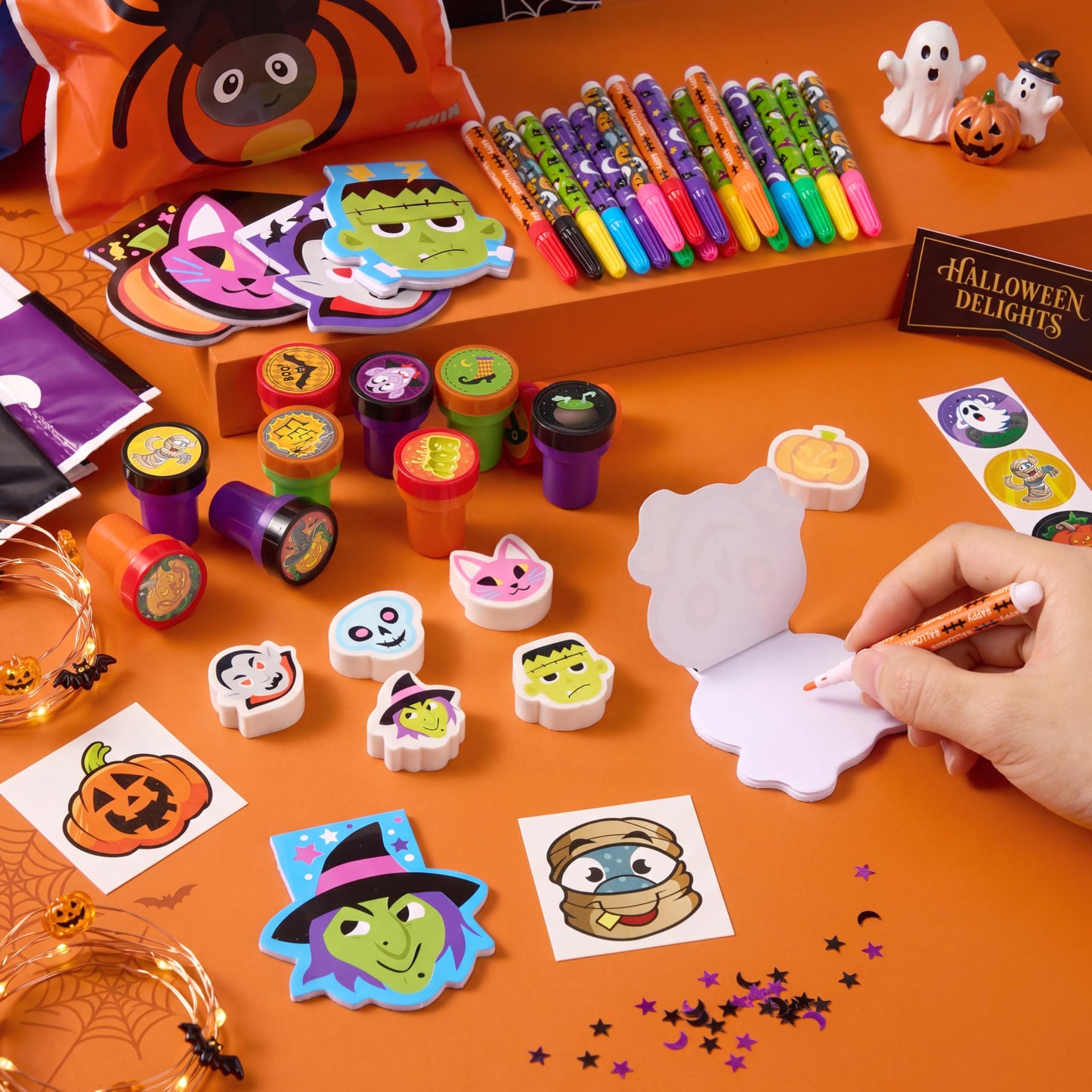 168 Pcs 24 Pack Assorted Halloween Art and Craft Stationery Kids Gift Set Trick or Treat Party Favor Toy Including Halloween Bag, Notepads, Stamps, Pencils, Stickers and Temporary Tattoos