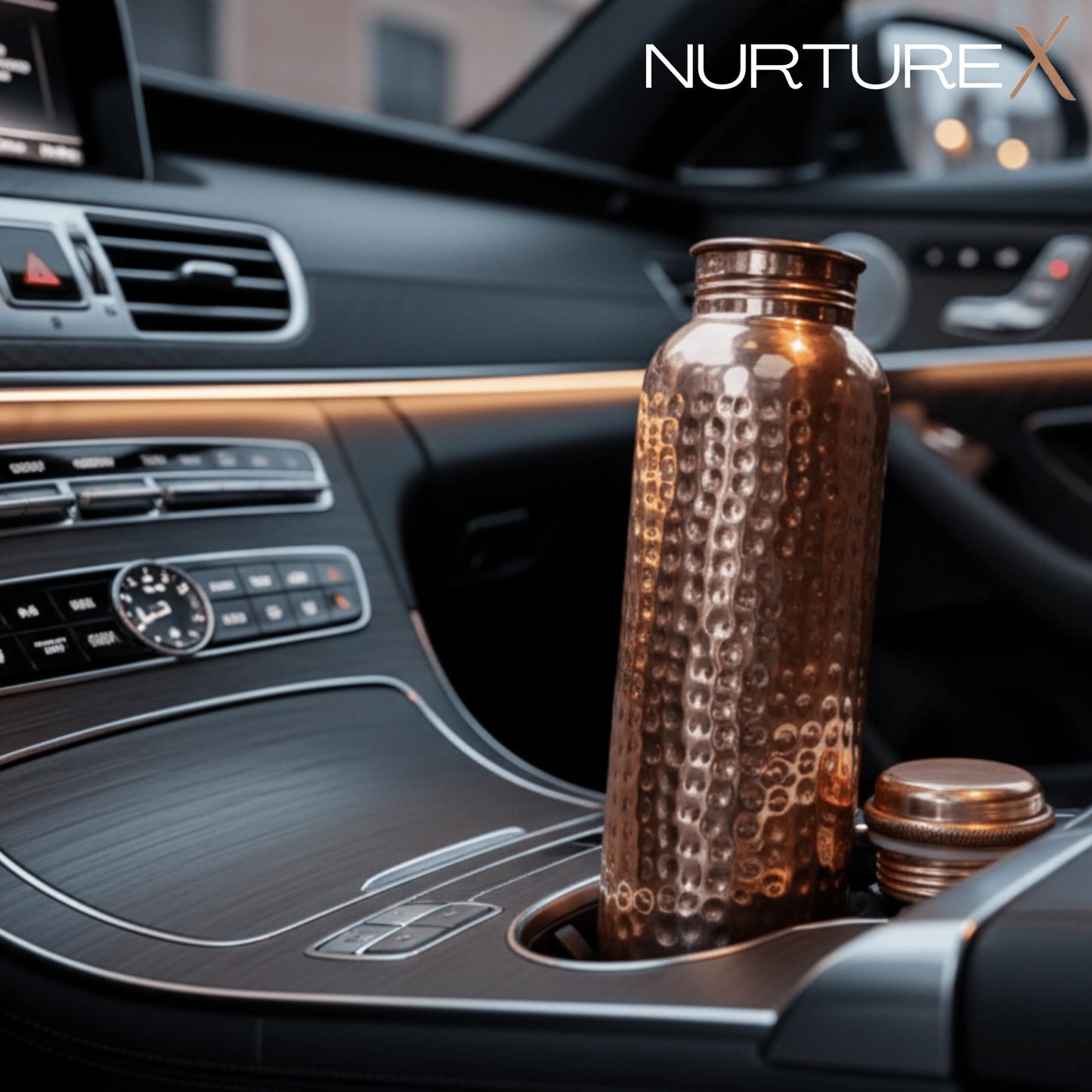 NurtureX Copper Water Bottle, 34 Oz / 1 Liter, ANTI-TARNISH Protective Coating, Leak-Proof, Joint-Free, Handcrafted, Eco-Friendly & Ayurvedic Drinkware for Yoga, Gym & Office - Hammered