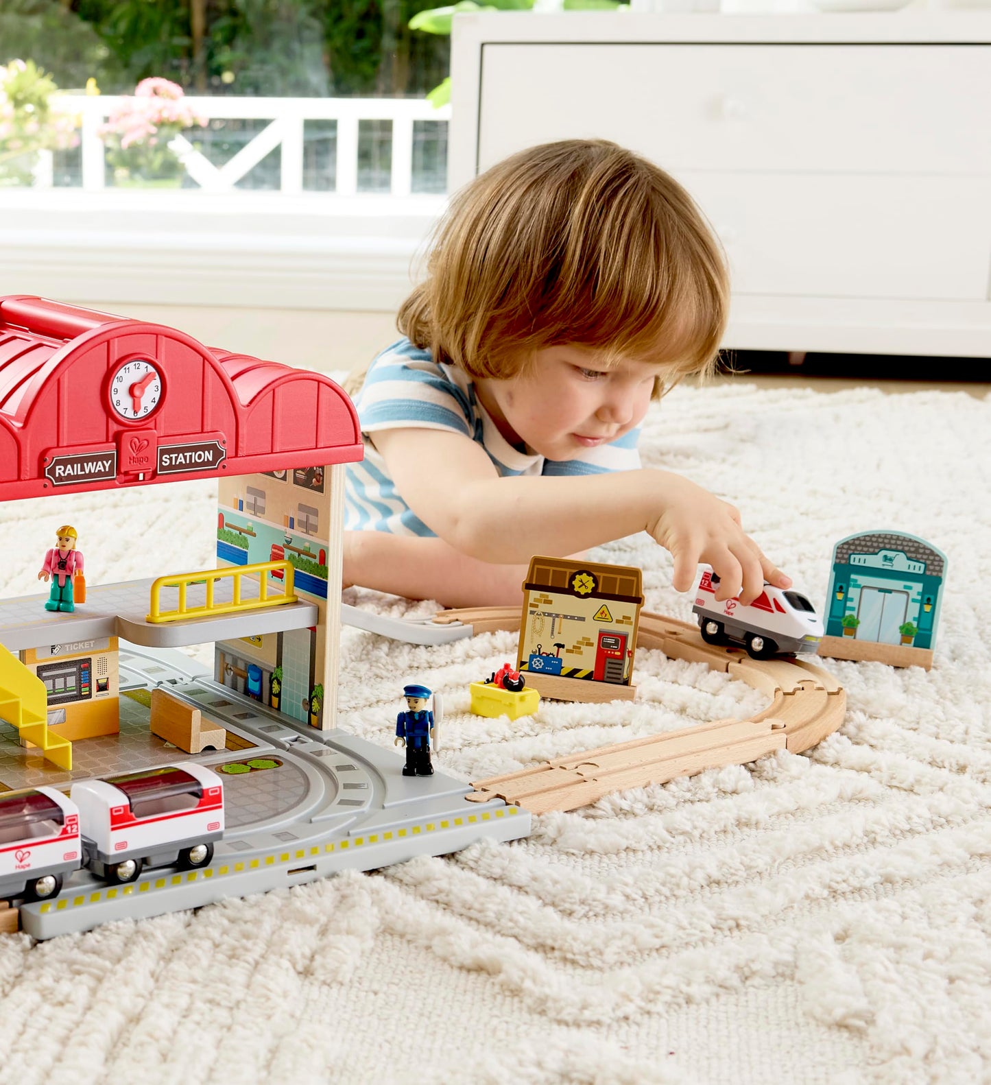Hape Portable Wooden Train Station Set, Children's Train Set, Rails, Train Station and Characters, Easy to Carry