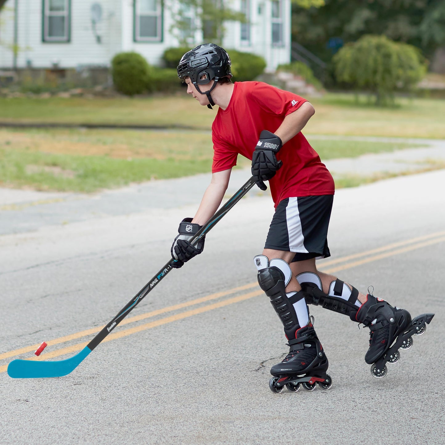 Franklin Sports NHL Youth Street Hockey Stick - Power 1040 Kids Outdoor Street Hockey Sticks - 40" Inch Youth Hockey Stick for Kids - Right Handed Hockey Stick - Wood/Fiberglass Shaft - Lefty