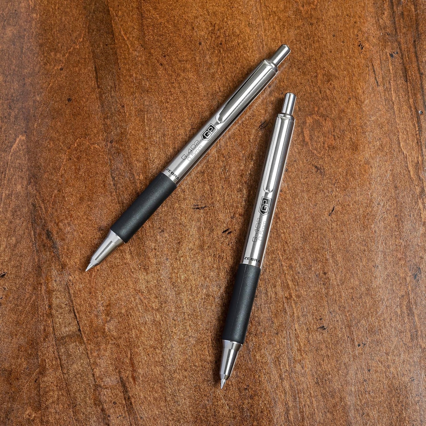 Zebra Pen STEEL G-402 Retractable Gel Pens - 0.5mm Fine Point - Smooth Black Ink - Rapid Dry Ink for No Smears or Smudges - Refillable Stainless Steel Writing Pens for Office, School, 12-Pack (49210)