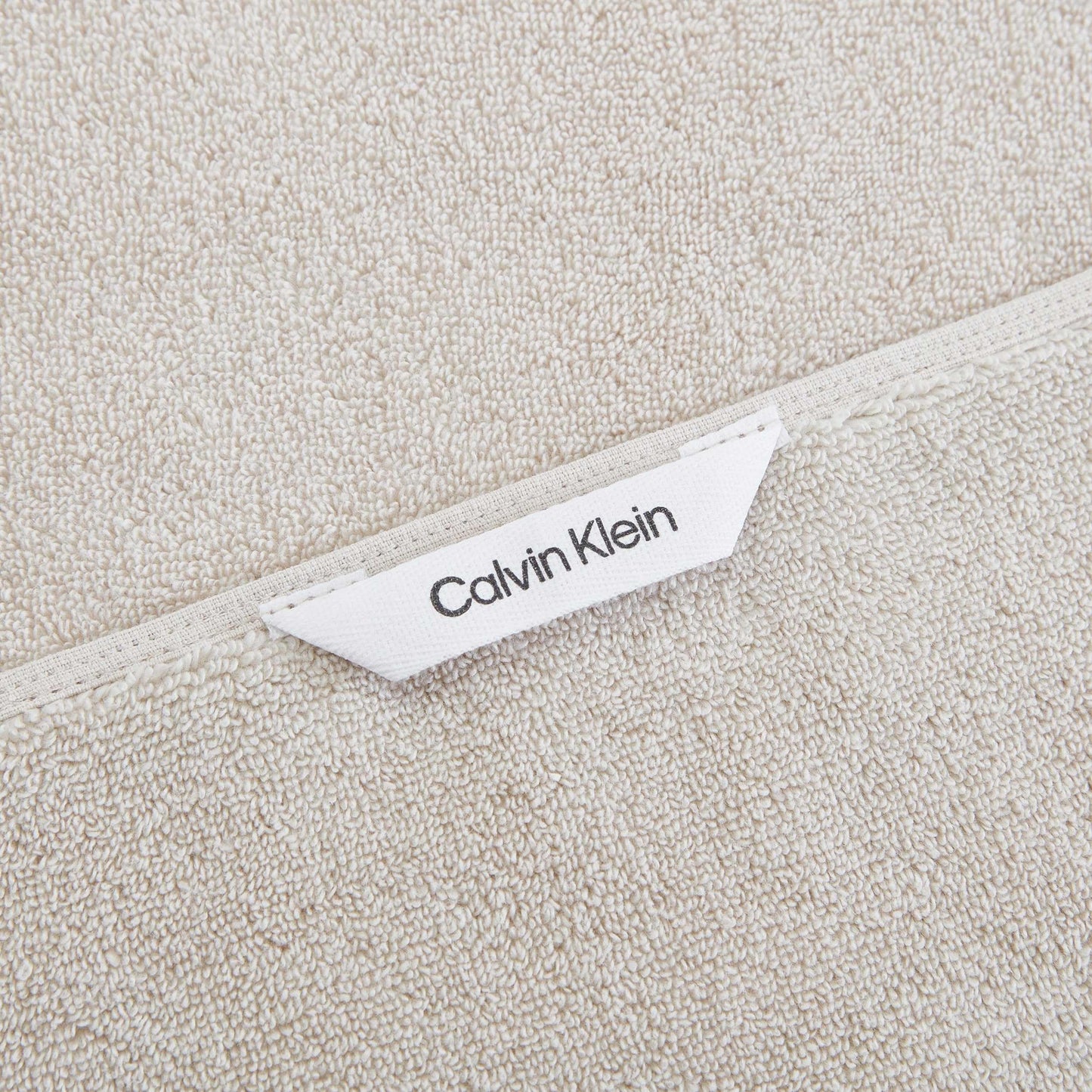 Calvin Klein - Bath Towels, Super Soft & Absorbent Cotton Towels, Zero Twist Construction, Brand Locker Loop for Easy Hanging (Iconic Solid Beige, 3 Piece)