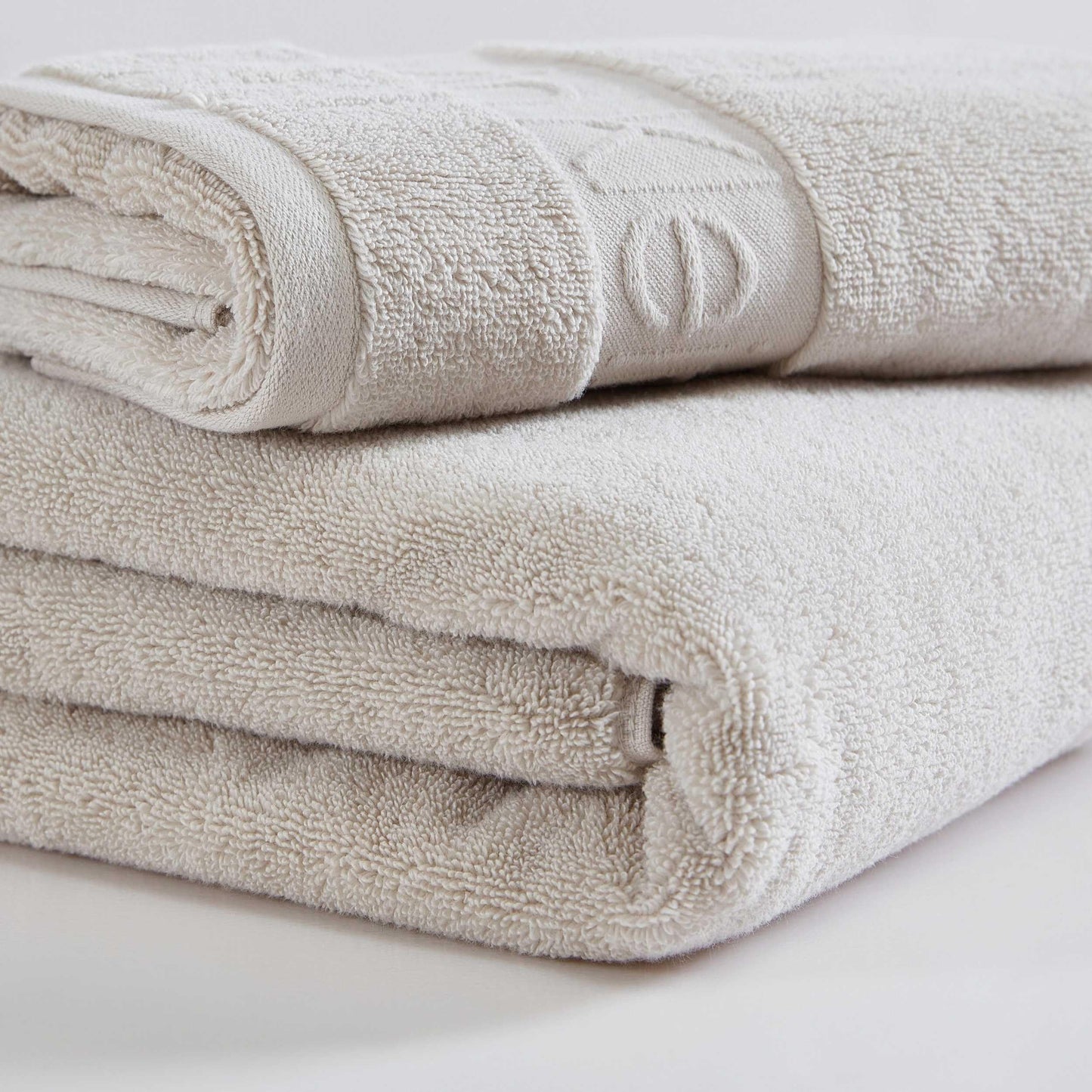 Calvin Klein - Bath Towels, Super Soft & Absorbent Cotton Towels, Zero Twist Construction, Brand Locker Loop for Easy Hanging (Iconic Solid Beige, 3 Piece)
