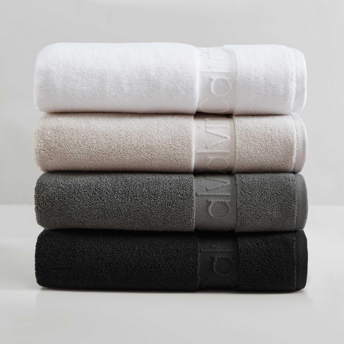Calvin Klein - Bath Towels, Super Soft & Absorbent Cotton Towels, Zero Twist Construction, Brand Locker Loop for Easy Hanging (Iconic Solid Beige, 3 Piece)