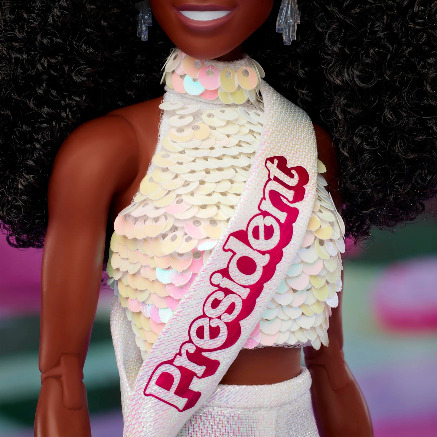 Barbie The Movie President Collectible Doll, ISSA Rae as President Wearing Shimmery White Blouse & Short Set, with Dark Curly Hair & President Sash