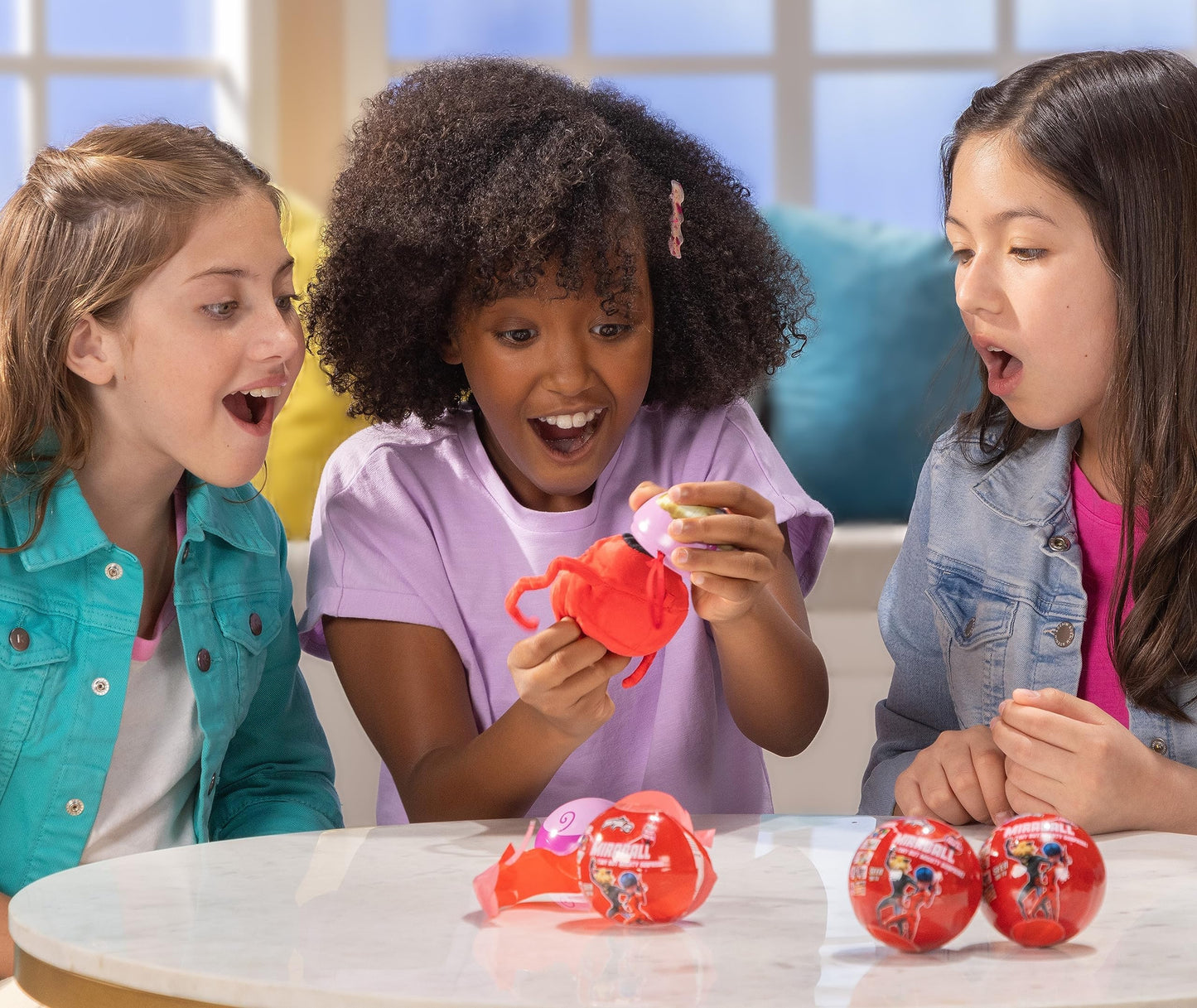 Miraculous Ladybug, 4-1 Capsule Collectible Toy, [PACK OF 4], Surprise Miraball with expanding Plush Kwami, Collectible Character Metal Case, Glittery Stickers & hanging Display Ribbon