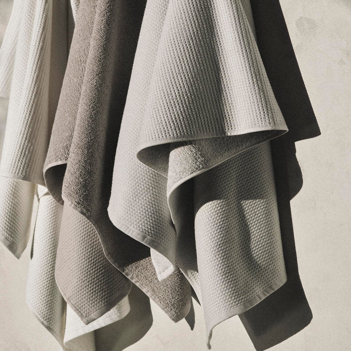 Calvin Klein - Bath Towels, Super Soft & Absorbent Cotton Towels, Zero Twist Construction, Brand Locker Loop for Easy Hanging (Iconic Solid Beige, 3 Piece)